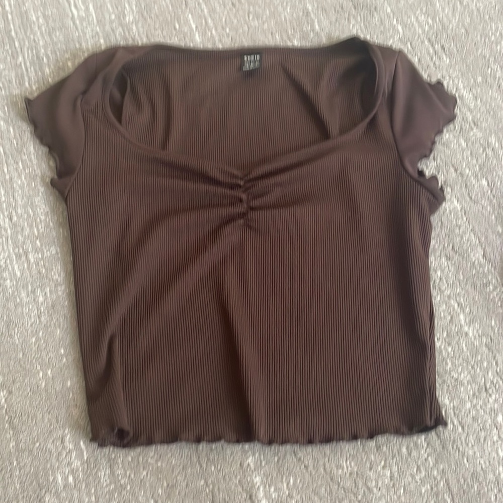 brown shirt